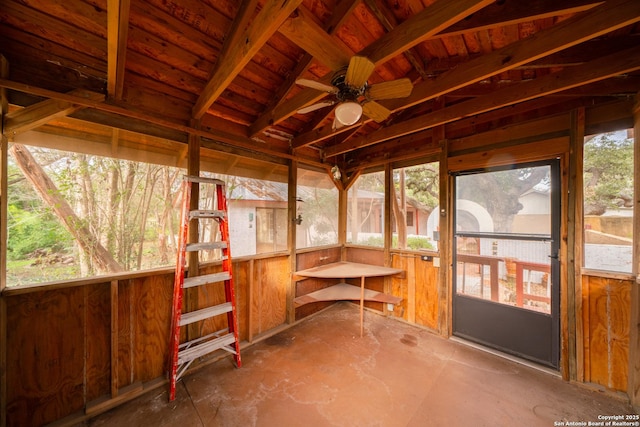 sunroom / solarium with vaulted ceiling with beams, wood ceiling, and ceiling fan