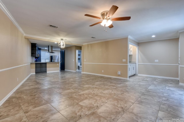 unfurnished living room with ceiling fan and ornamental molding