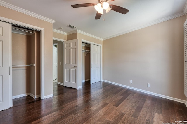 unfurnished bedroom with ceiling fan, dark hardwood / wood-style flooring, and crown molding