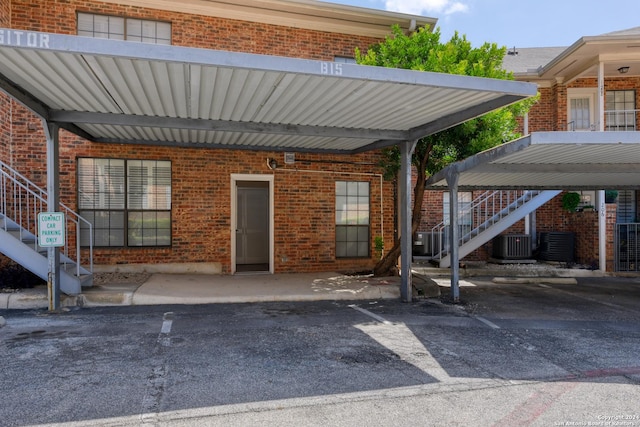 exterior space featuring a carport