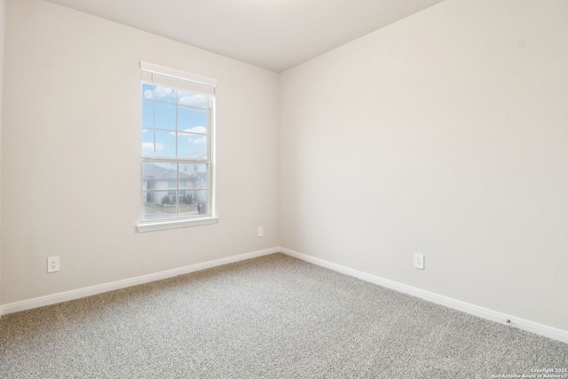 empty room featuring carpet flooring