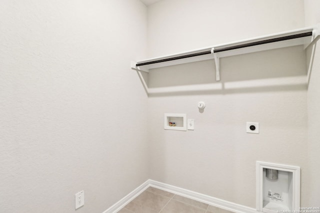 laundry area featuring electric dryer hookup, hookup for a washing machine, hookup for a gas dryer, and tile patterned floors