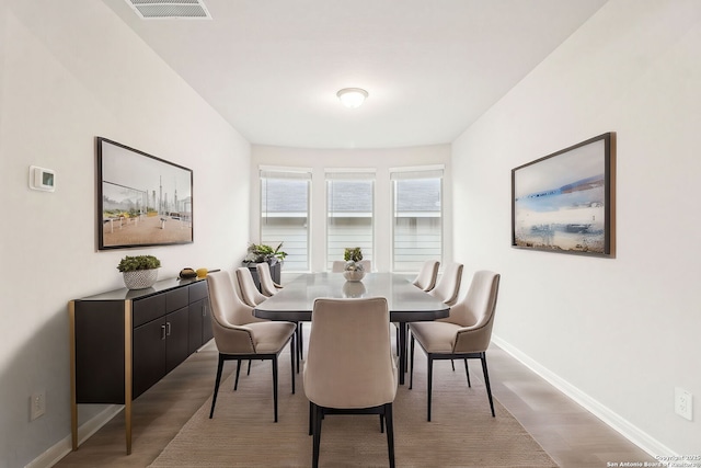 dining space featuring light hardwood / wood-style flooring