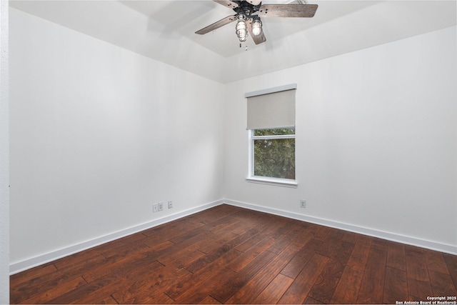 empty room featuring ceiling fan and hardwood / wood-style flooring