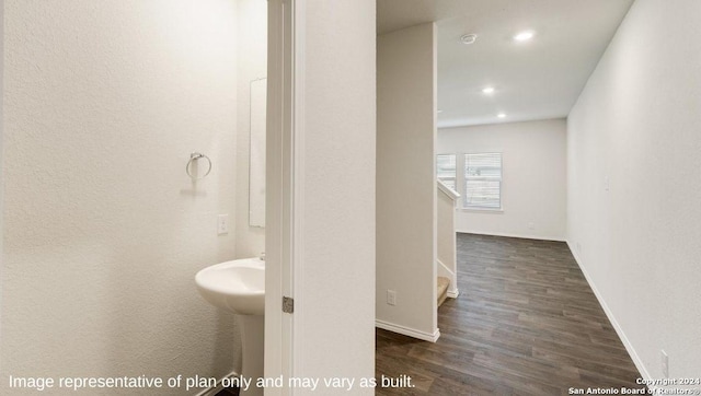 bathroom with wood-type flooring