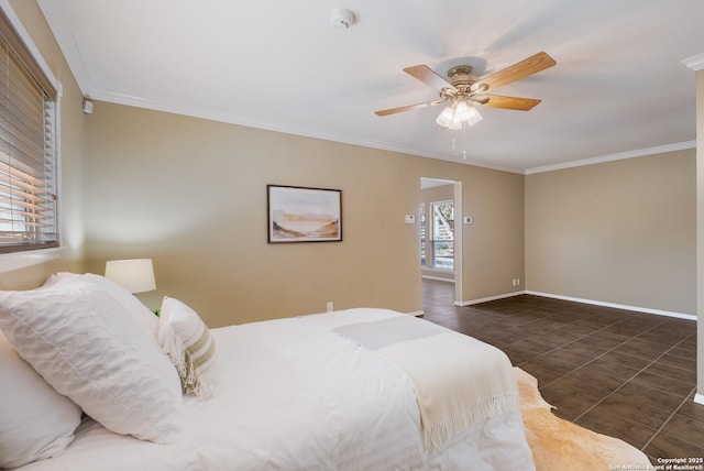 tiled bedroom with ceiling fan and crown molding