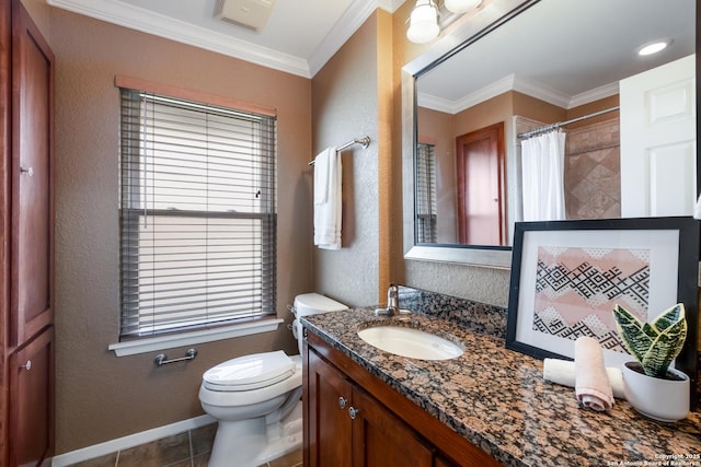 bathroom featuring tile patterned flooring, crown molding, a shower with curtain, and vanity