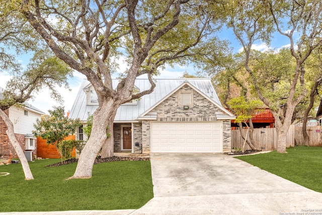 view of property with a front lawn, a garage, and cooling unit