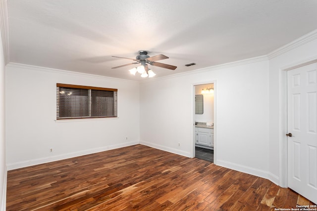 unfurnished bedroom with ceiling fan, dark hardwood / wood-style flooring, ensuite bathroom, and ornamental molding