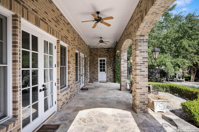 view of patio featuring ceiling fan and french doors