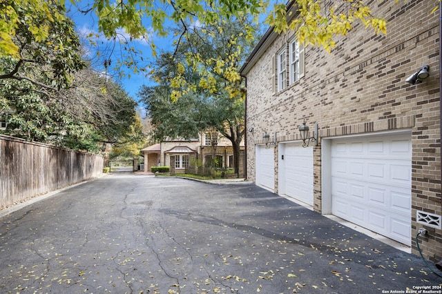 exterior space with a garage