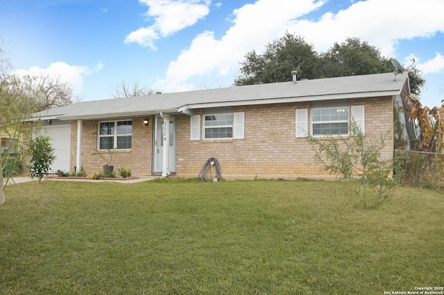 single story home featuring a front yard and a garage