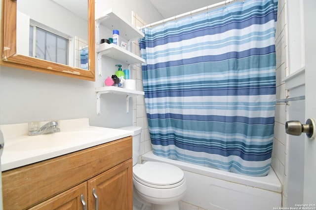 full bathroom featuring toilet, shower / tub combo, and vanity