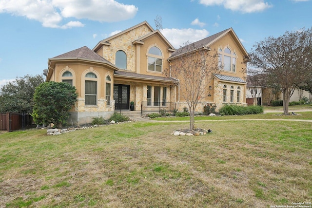 view of front of property with a front lawn