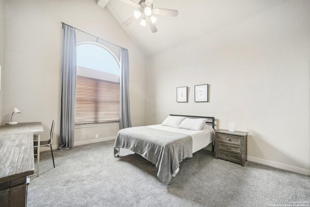 bedroom featuring ceiling fan, vaulted ceiling with beams, multiple windows, and carpet flooring