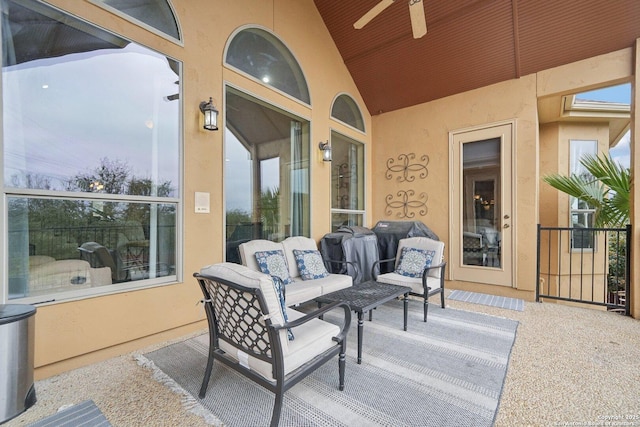 view of patio featuring an outdoor hangout area and ceiling fan