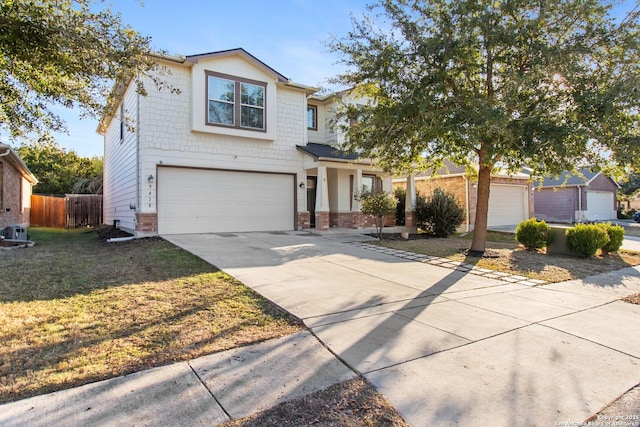 view of front property with a front yard and a garage