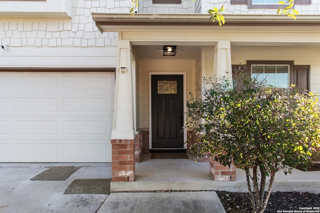 property entrance with a garage