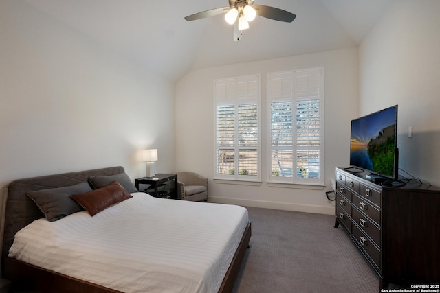 carpeted bedroom featuring ceiling fan and lofted ceiling