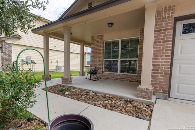 view of patio featuring a porch and central air condition unit