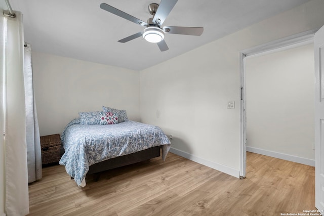 bedroom featuring ceiling fan and light hardwood / wood-style floors