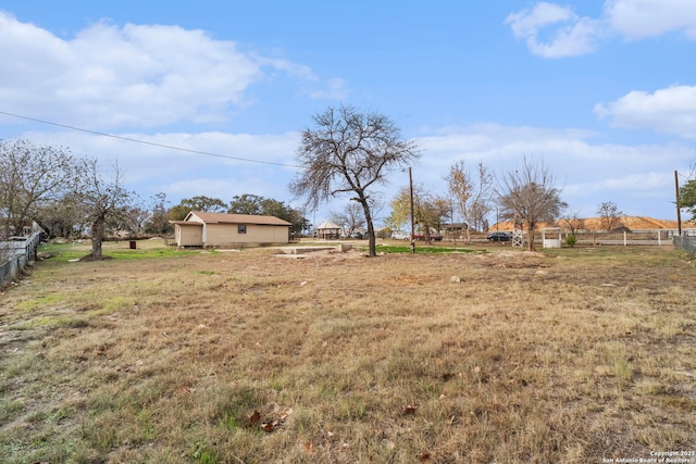 view of yard with a rural view