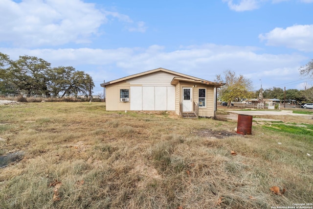 exterior space with a front lawn