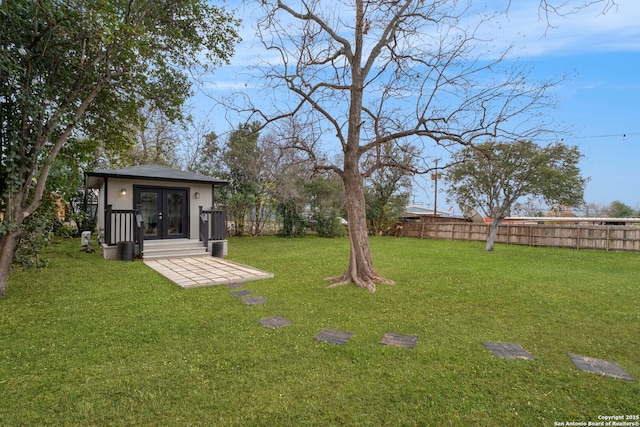 view of yard with french doors