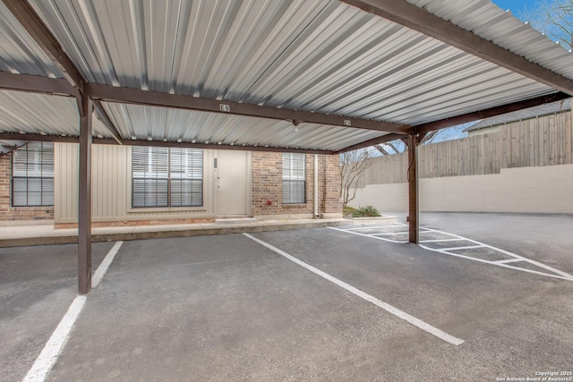 exterior space with a carport