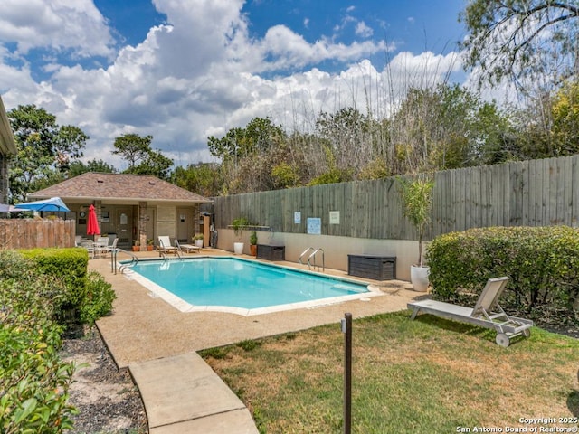 view of pool featuring a patio area