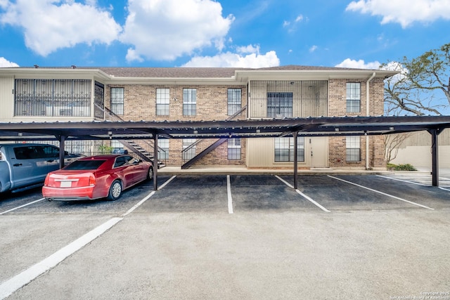 7926 Broadway Unit 402, San Antonio, TX 78209 - view of parking with a carport