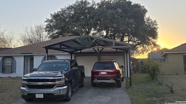 parking at dusk with a carport