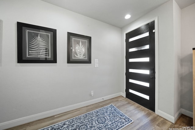 entryway with light hardwood / wood-style floors