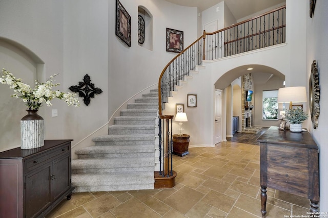 foyer with a towering ceiling