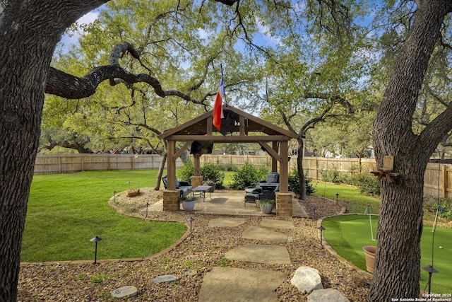 view of yard with a gazebo and a patio area