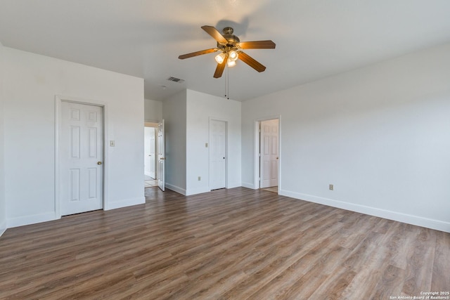 unfurnished bedroom featuring ceiling fan and wood-type flooring