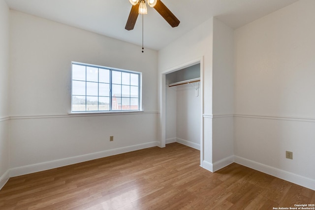 unfurnished bedroom with ceiling fan, light hardwood / wood-style floors, and a closet