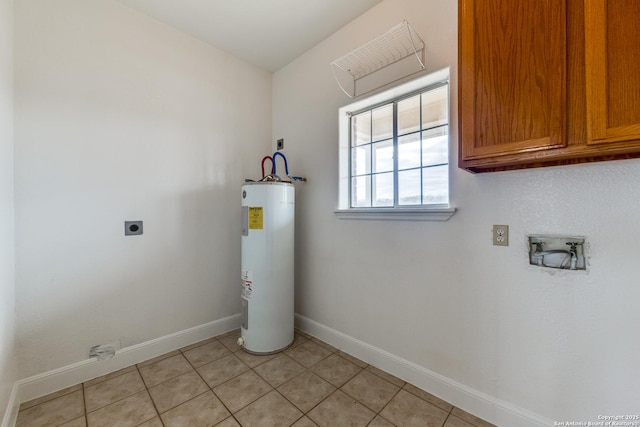 washroom with water heater, light tile patterned floors, electric dryer hookup, washer hookup, and cabinets