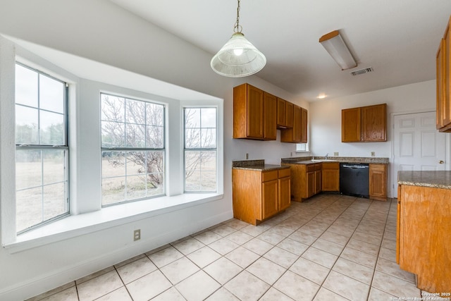 kitchen featuring decorative light fixtures, light tile patterned floors, light stone countertops, and dishwasher