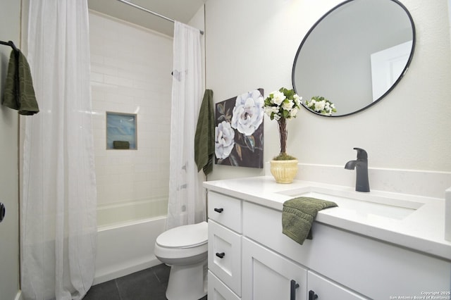 full bath with vanity, tile patterned floors, toilet, and shower / bath combo