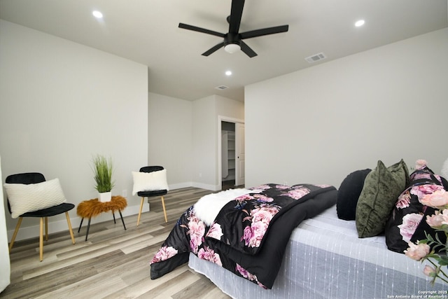 bedroom with visible vents, baseboards, recessed lighting, wood finished floors, and a ceiling fan