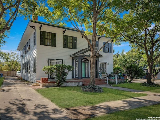 view of front of property with a front lawn