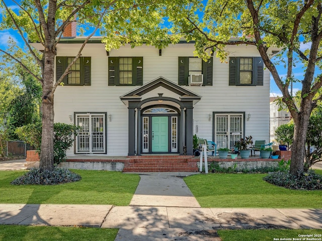 view of front of house with a front yard