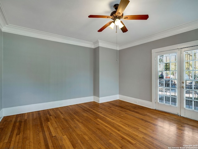 spare room with ceiling fan, french doors, ornamental molding, and hardwood / wood-style floors