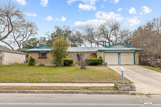 single story home with a garage and a front yard