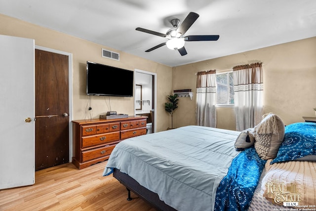 bedroom featuring ceiling fan and light hardwood / wood-style flooring