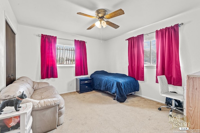 bedroom with ceiling fan and carpet floors