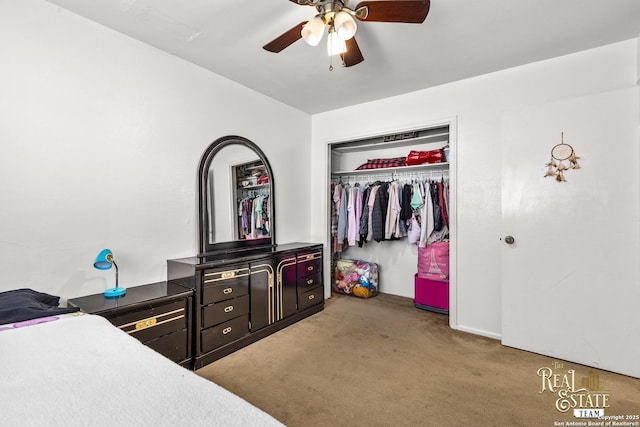 bedroom with ceiling fan, carpet, and a closet