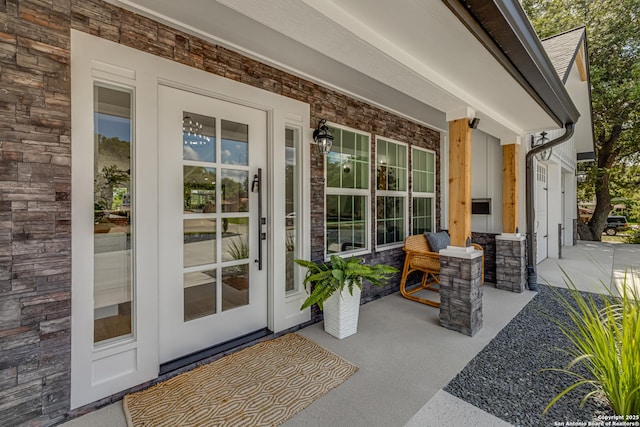 view of patio featuring a porch