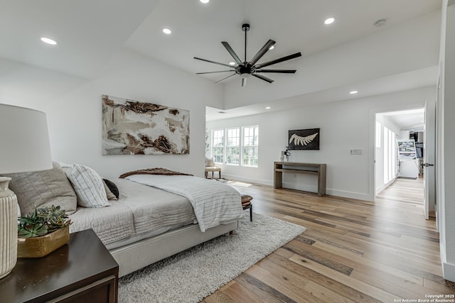 bedroom featuring ceiling fan and light wood-type flooring